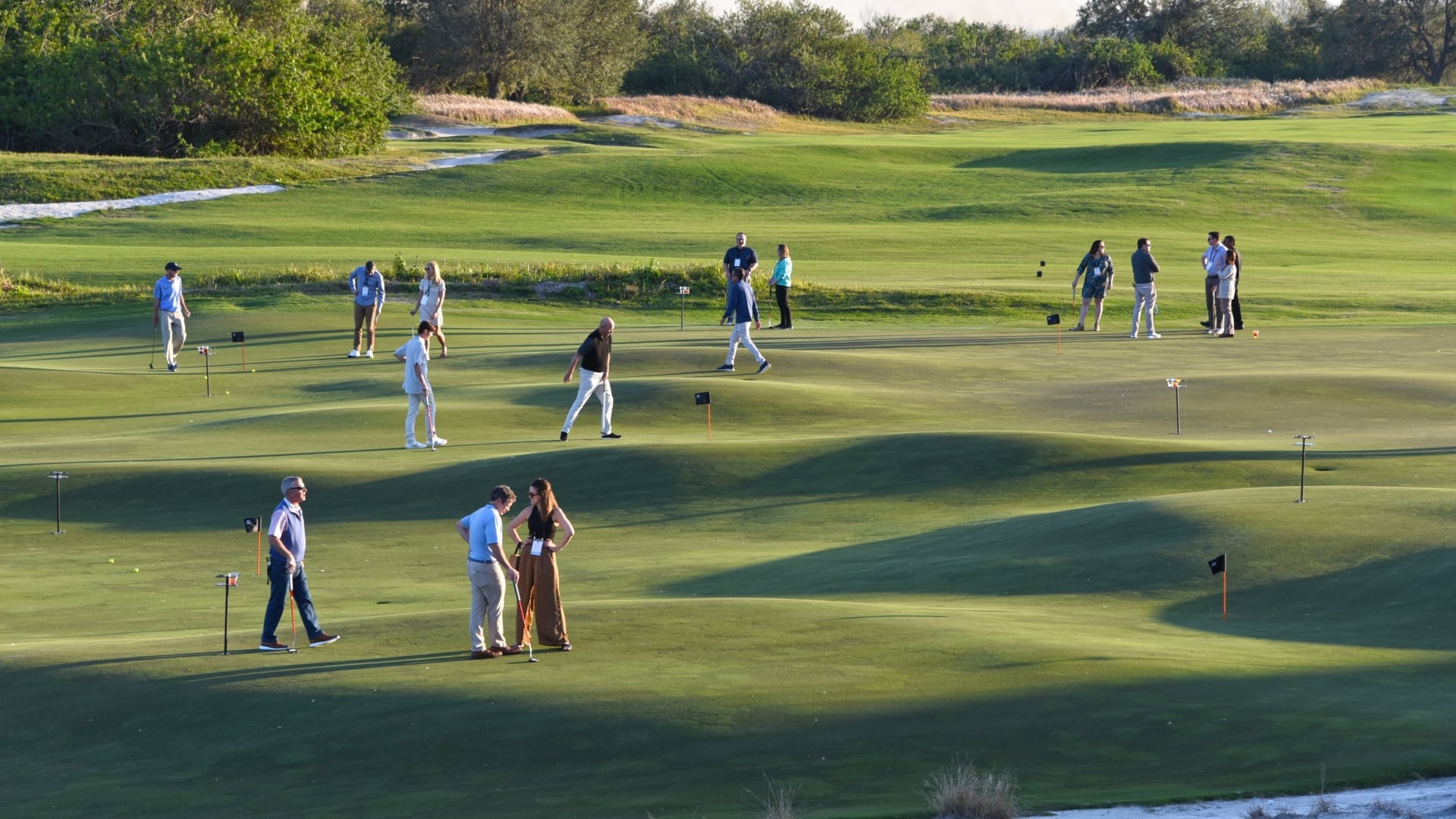 A corporate group gathered on a Streamsong course
